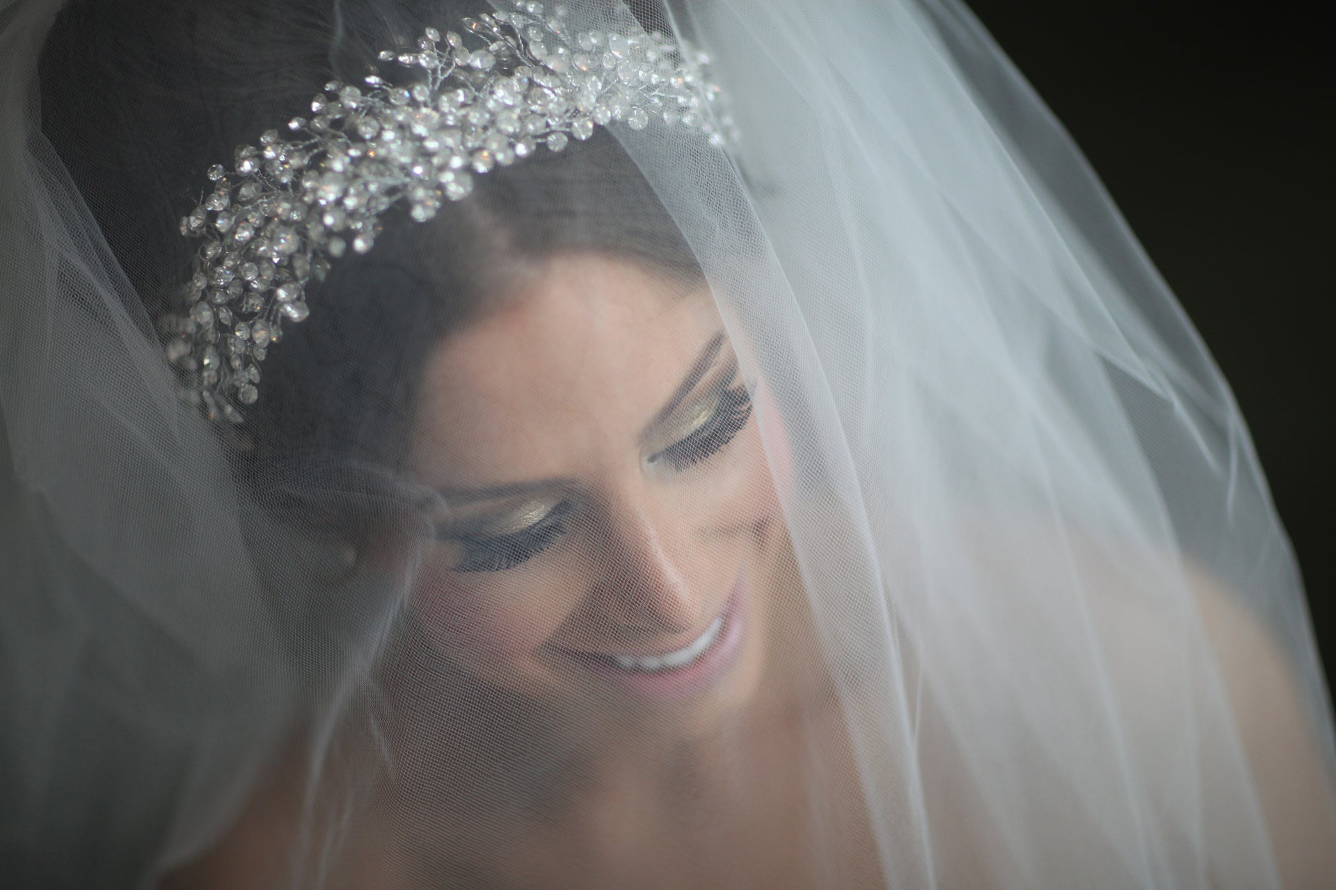 bride in Christie Lauren head piece