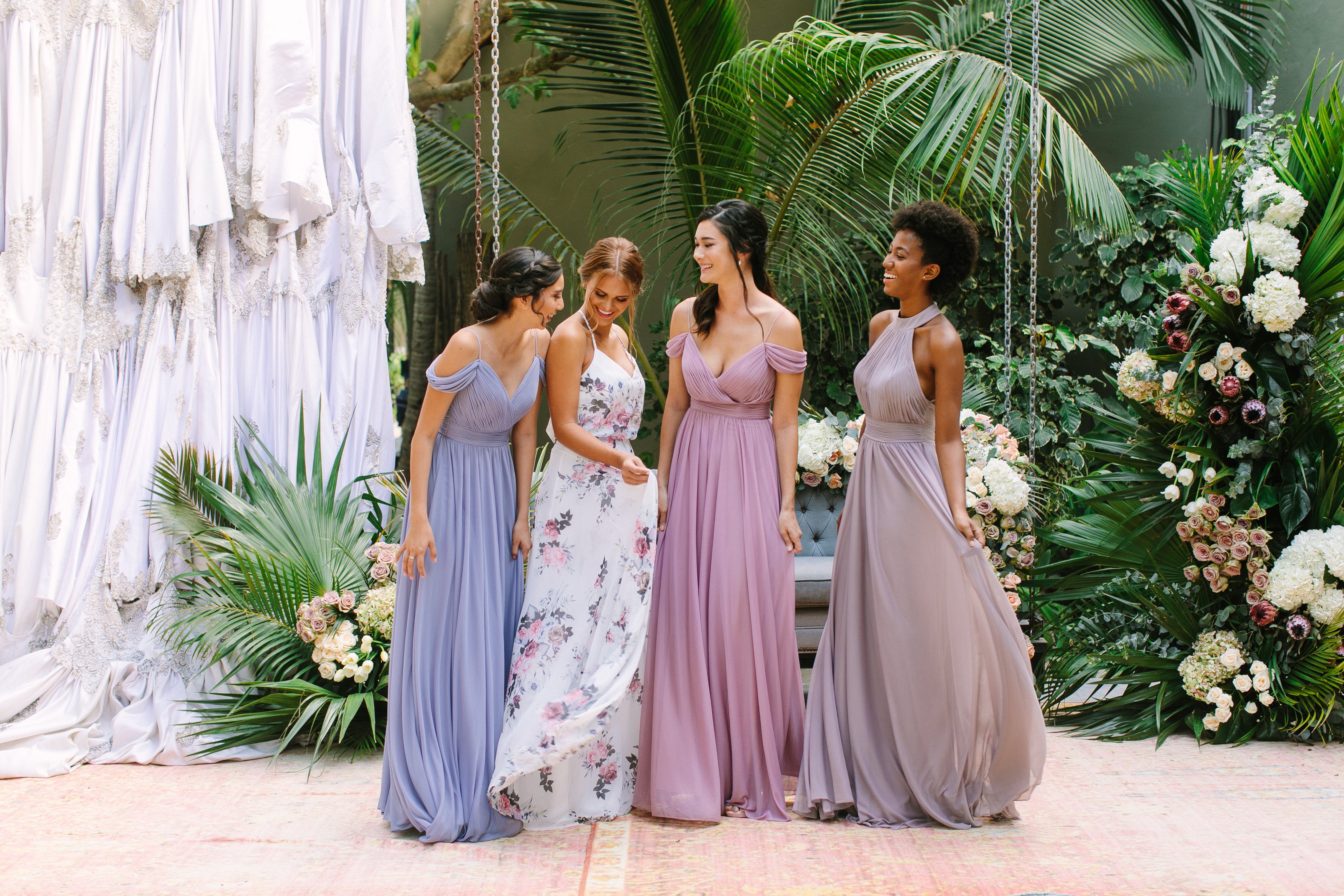Affordable bridesmaids dresses perfect for destination weddings—We took Kleinfeld Bridal wedding dresses and Kleinfeld Bridal Party bridesmaids dresses to Tulum, Mexico for a fun photoshoot on the beach full of flowers, sun, sand and fun!