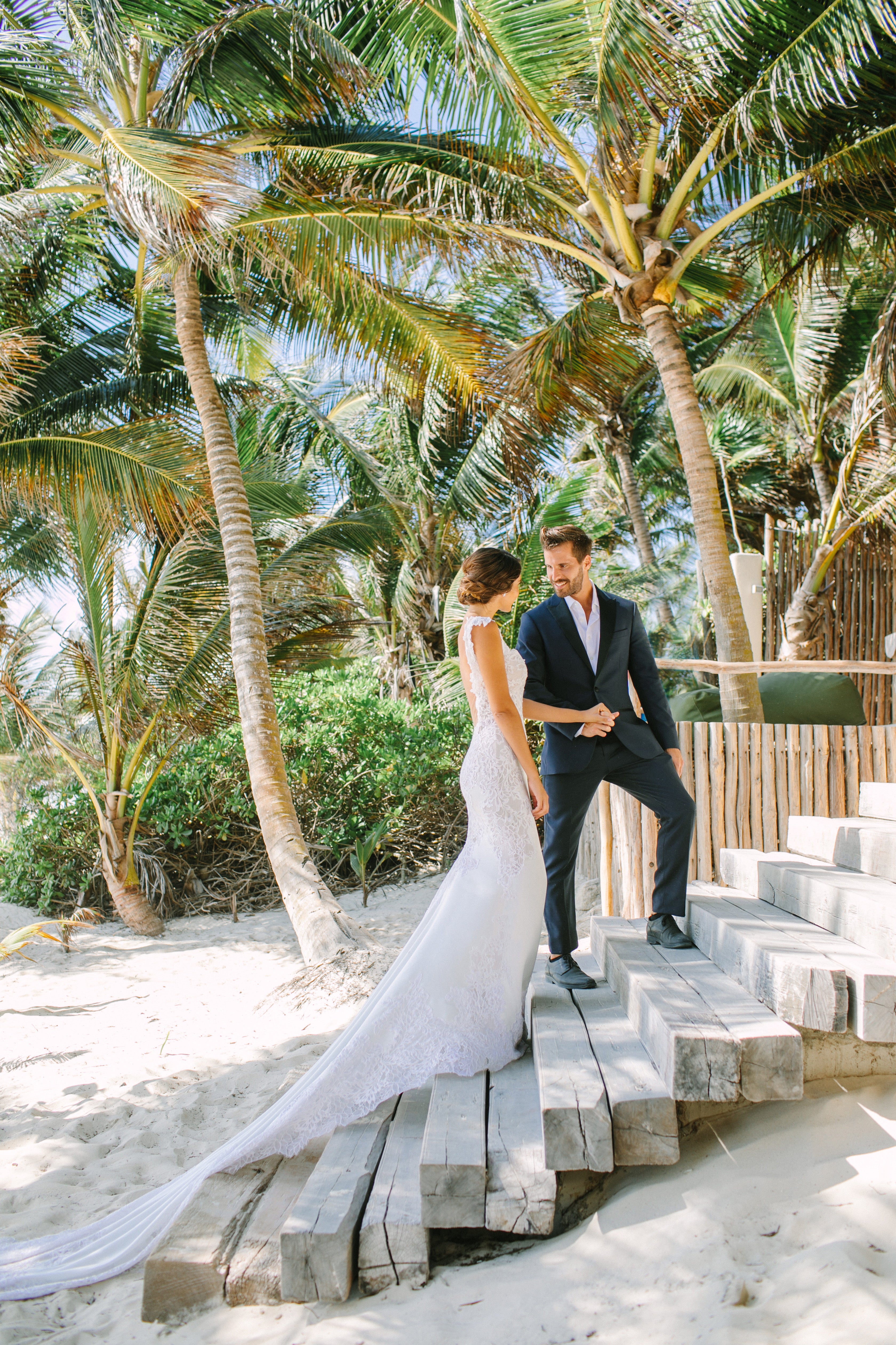 We’re Obsessed with Weddings in Tulum–Here’s Why! We took Kleinfeld Bridal wedding dresses and Kleinfeld Bridal Party bridesmaids dresses to Tulum, Mexico for a fun photoshoot on the beach full of flowers, sun, sand and fun!