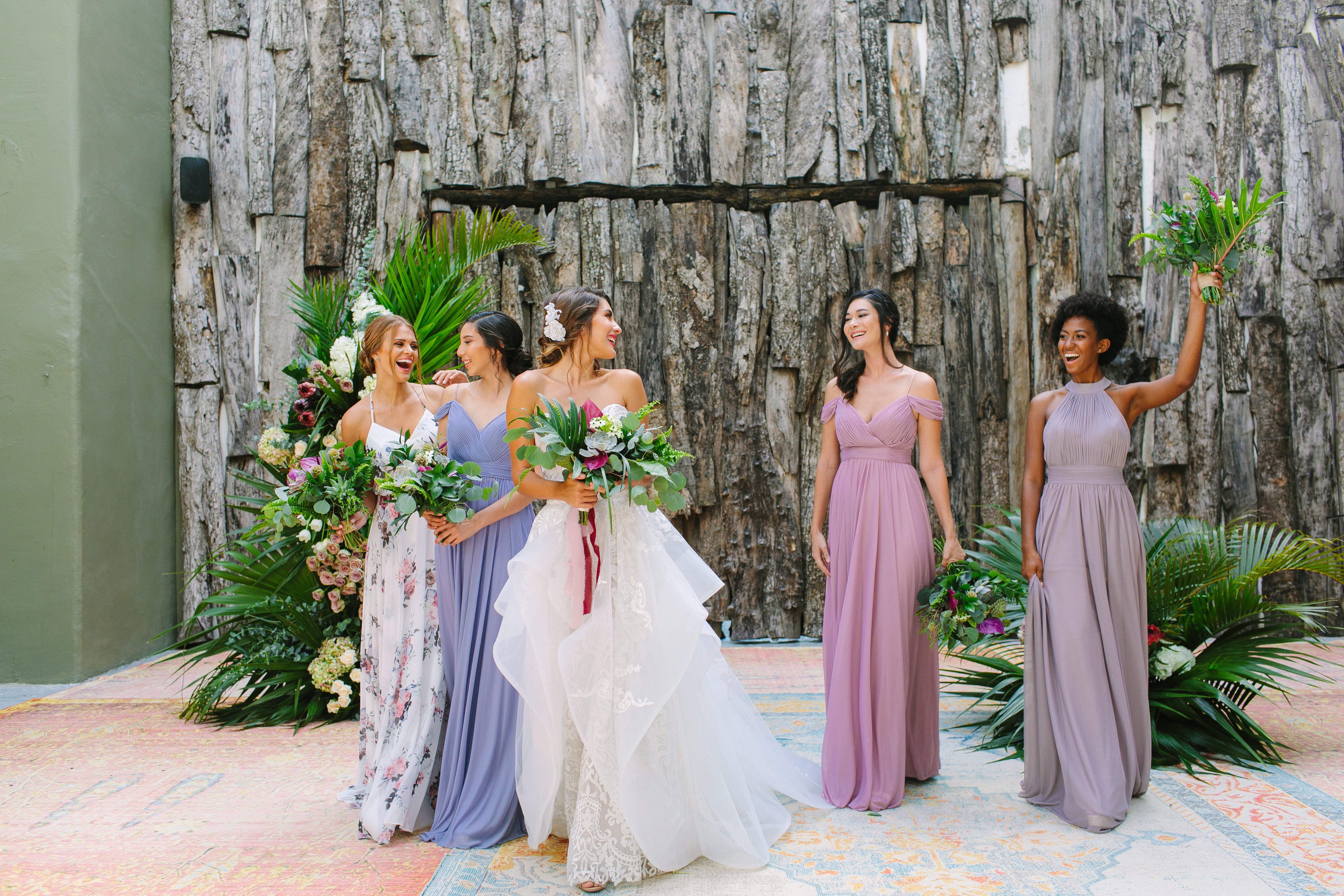 7 tips for wedding photos you'll love: We took Kleinfeld Bridal wedding dresses and Kleinfeld Bridal Party bridesmaids dresses to Tulum, Mexico for a fun photoshoot on the beach full of flowers, sun, sand and fun!