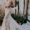 Sheer Floral Lace Wedding Dress With Long Sleeves by Essense of Australia - Image 1