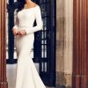 Simple Fit And Flare Long Sleeve Wedding Dress With Beaded Belt by Paloma Blanca - Image 1