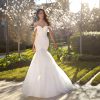 Strapless Sweetheart Neckline Ruched Mermaid Wedding Dress with Beaded Bodice and Tulle Skirt by Pronovias x Kleinfeld - Image 1