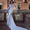 Long Sleeve V-neckline Sheath Wedding Dress with Lace Inserts - Image 1