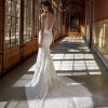 Sleeveless V-neckline Sheath Wedding Dress with Beaded Lace Bodice and Crepe Skirt by Pronovias x Kleinfeld - Image 2