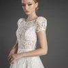 High Neck Short Puff Sleeve All Over Lace A-line Wedding Dress by Love by Pnina Tornai - Image 1