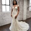 SEXY FIT-AND-FLARE WEDDING DRESS WITH ORNATE LACE EMBELLISHMENTS by Martina Liana - Image 1
