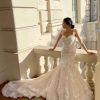 PLUNGING V-NECKLINE WEDDING DRESS WITH FLORAL SKIRT by Martina Liana - Image 1