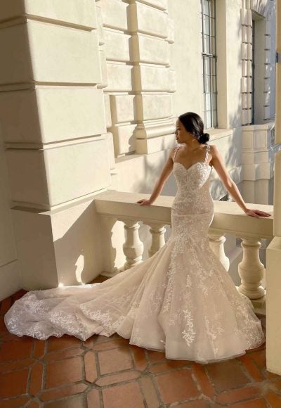 PLUNGING V-NECKLINE WEDDING DRESS WITH FLORAL SKIRT by Martina Liana