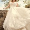Modern Princess Wedding Dress With A Tiered Sequin Tulle Skirt by Maggie Sottero - Image 1