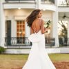 MINIMALIST FIT-AND-FLARE WEDDING GOWN WITH BOW by Martina Liana - Image 2