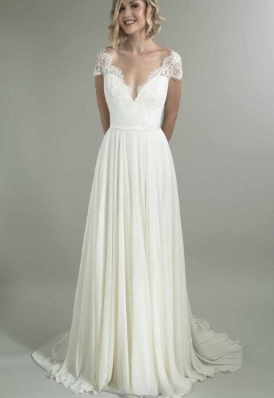 Cap Sleeve V-neckline A-line Wedding Dress With Lace Bodice And Flowing Skirt by Augusta Jones