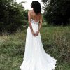 MODERN A-LINE BOHO WEDDING DRESS WITH MINIMALIST STRAPS AND PLUNGING V-NECK by All Who Wander - Image 2