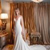 Sleeveless V-neckline Crepe Sheath Wedding Dress by Estee Couture - Image 1