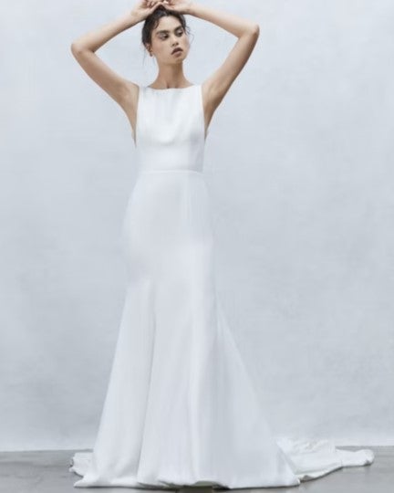Sleeveless Fit to Flare Wedding Dress with Bateau Neckline and Plunging Back with Buttons to Hem by Alyne by Rita Vinieris - Image 1