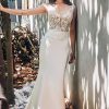 Sleeveless Fit And Flare Wedding Dress With V-neckline And Illusion Bodice by Madison James - Image 1