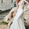 Lace Fit And Flare Wedding Dress With V-neckline And Cap Sleeves by Maison Signore - Image 1