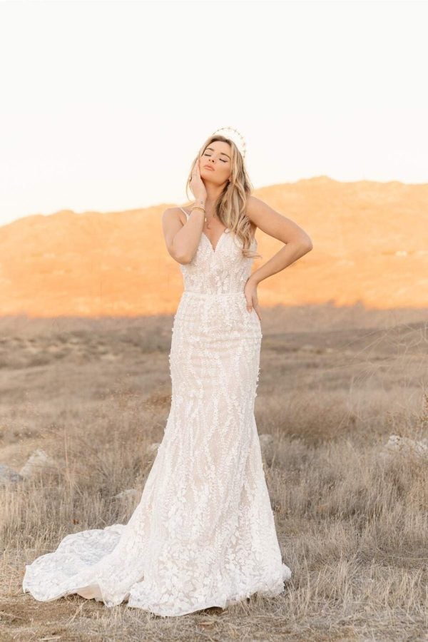 Boho Lace Fit And Flare Wedding Dress With Plunging V-neckline by All Who Wander - Image 1