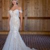 Lace Fit And Flare Off The Shoulder Wedding Dress by Essense of Australia - Image 1