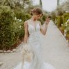 Lace Fit And Flare Wedding Dress With Plunging V-neckline by Essense of Australia - Image 1