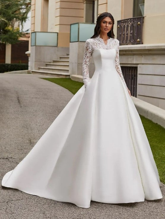 Strapless Ballgown Wedding Dress With Detachable Lace Jacket by Pronovias - Image 1