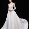 Strapless Satin Ballgown Wedding Dress With Detachable Long Sleeve Lace Bolero by Alyne by Rita Vinieris - Image 1