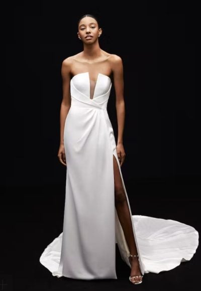 Strapless Satin Sheath Wedding Dress With Draped Bodice And Bow And Front Slit by Alyne by Rita Vinieris