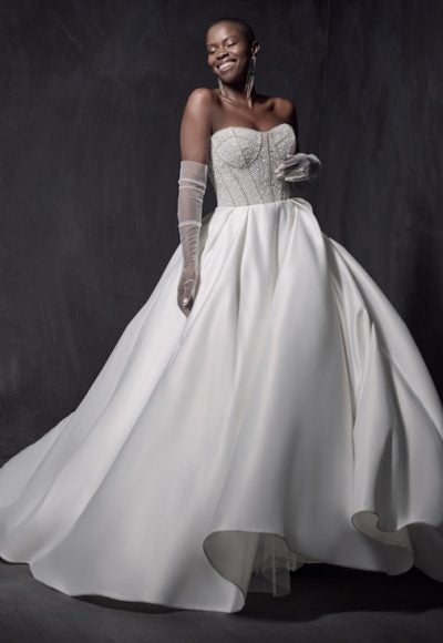 Strapless Sweeheart Neckline Ballgown Wedding Dress With Beaded Bodice And Satin Skirt by Maggie Sottero