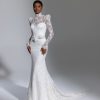 Long Sleeve High Neckline Lace Fit And Flare Wedding Dress With Bow And Puff Sleeves by Pnina Tornai - Image 1