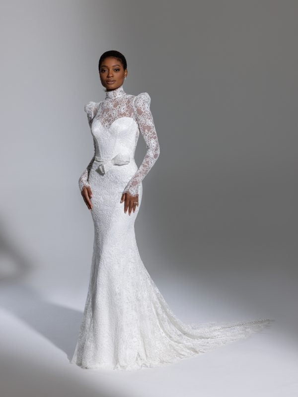 Long Sleeve High Neckline Lace Fit And Flare Wedding Dress With Bow And Puff Sleeves by Pnina Tornai - Image 1