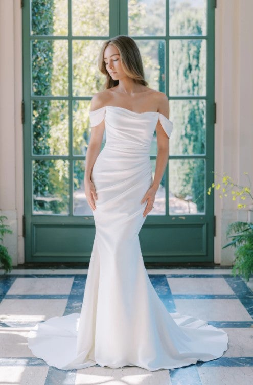 Off The Shoulder Draped Fit And Flare Wedding Dress by Anne Barge - Image 1