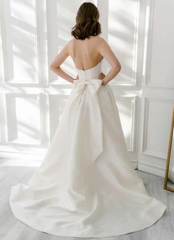 Strapless Ball Gown Wedding Dress With A Corset Bodice, Front Slit And Back Bow by Enaura Bridal - Image 2