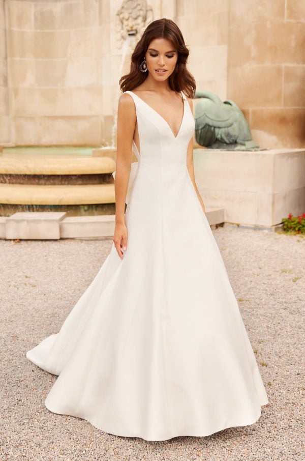 Sleeveless A-line Wedding Dress With V-neckline And Bow At Back by Paloma Blanca - Image 1