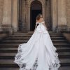 Off The Shoulder Ball Gown Wedding Dress With Corset Back With Bow by Disney Fairy Tale Weddings Collection - Image 2