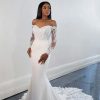 Long Sleeve Off The Shoulder Sheath Wedding Dress With Lace Bodice And Train by Martina Liana - Image 1