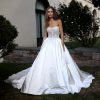 Strapless Ball Gown Wedding Dress With Beaded Corset Bodice by Eve of Milady - Image 1