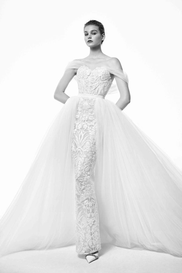 Beaded Lace Fit And Flare Wedding Dress With Detachable Overskirt by Nicole + Felicia - Image 1