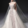 Beaded Strapless Fit And Flare Wedding Dress With Detachable Overskirt by Nicole + Felicia - Image 1
