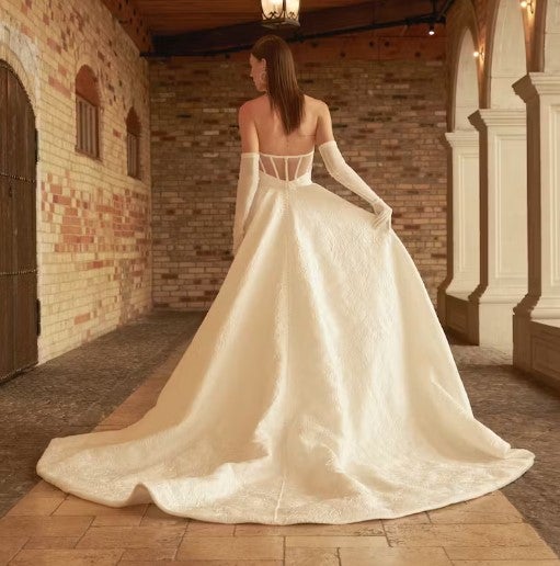 Strapless Ballgown Wedding Dress With Back Detail by Rivini - Image 2