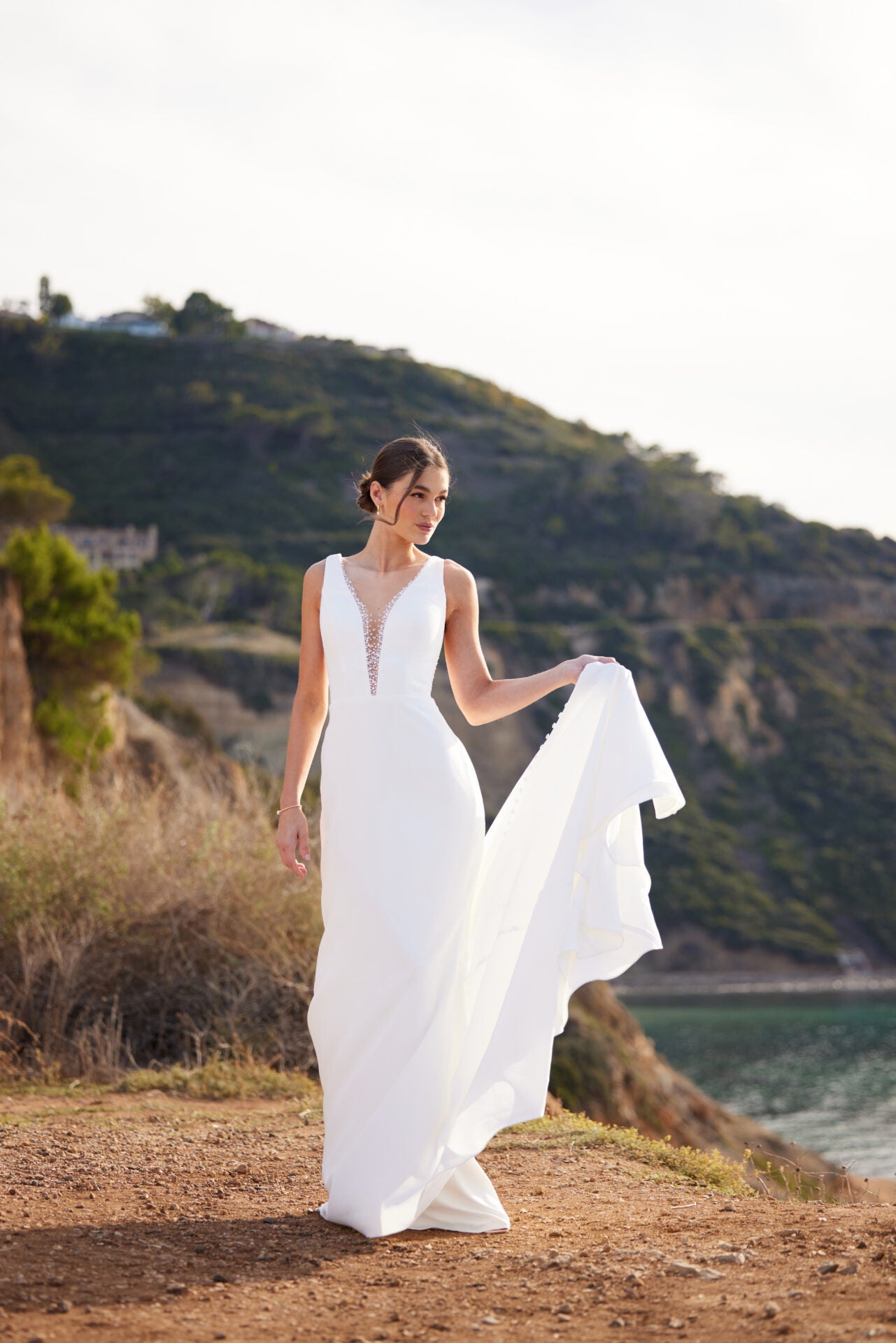 Sleeveless Fit And Flare Wedding Dress With Plunging V-neckline by Essense of Australia - Image 1
