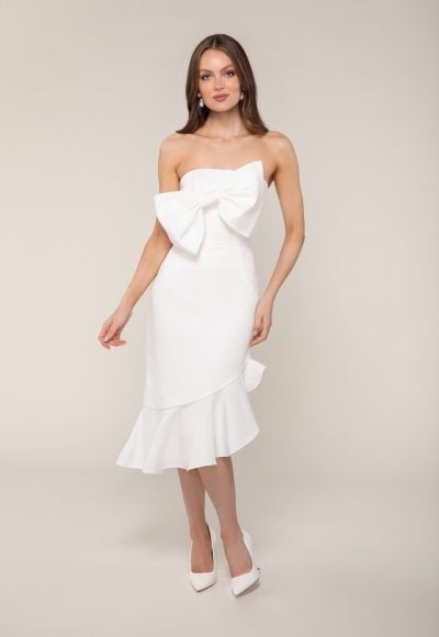 Straight Across Neckline Midi Length Dress Of Faille With An Angular Ruffle At The Hem And Dramatic Bow At Bust by Anne Barge