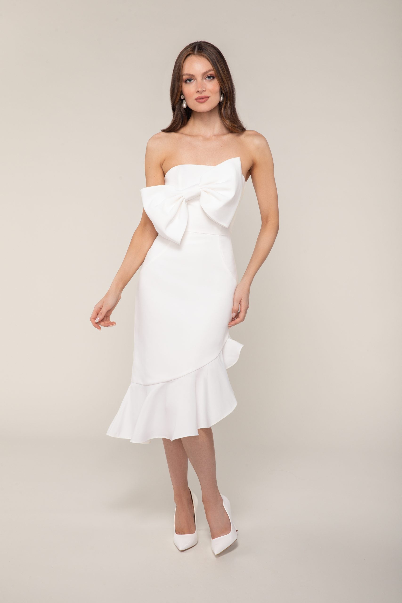 Straight Across Neckline Midi Length Dress Of Faille With An Angular Ruffle At The Hem And Dramatic Bow At Bust by Anne Barge - Image 1