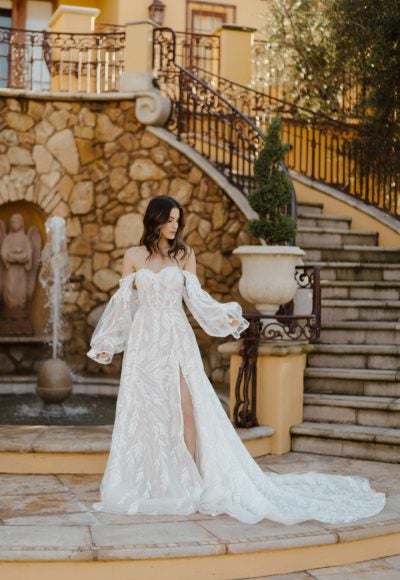 Lace A-line Wedding Dress With Front Slit And Off The Shoulder Sleeves by Martina Liana