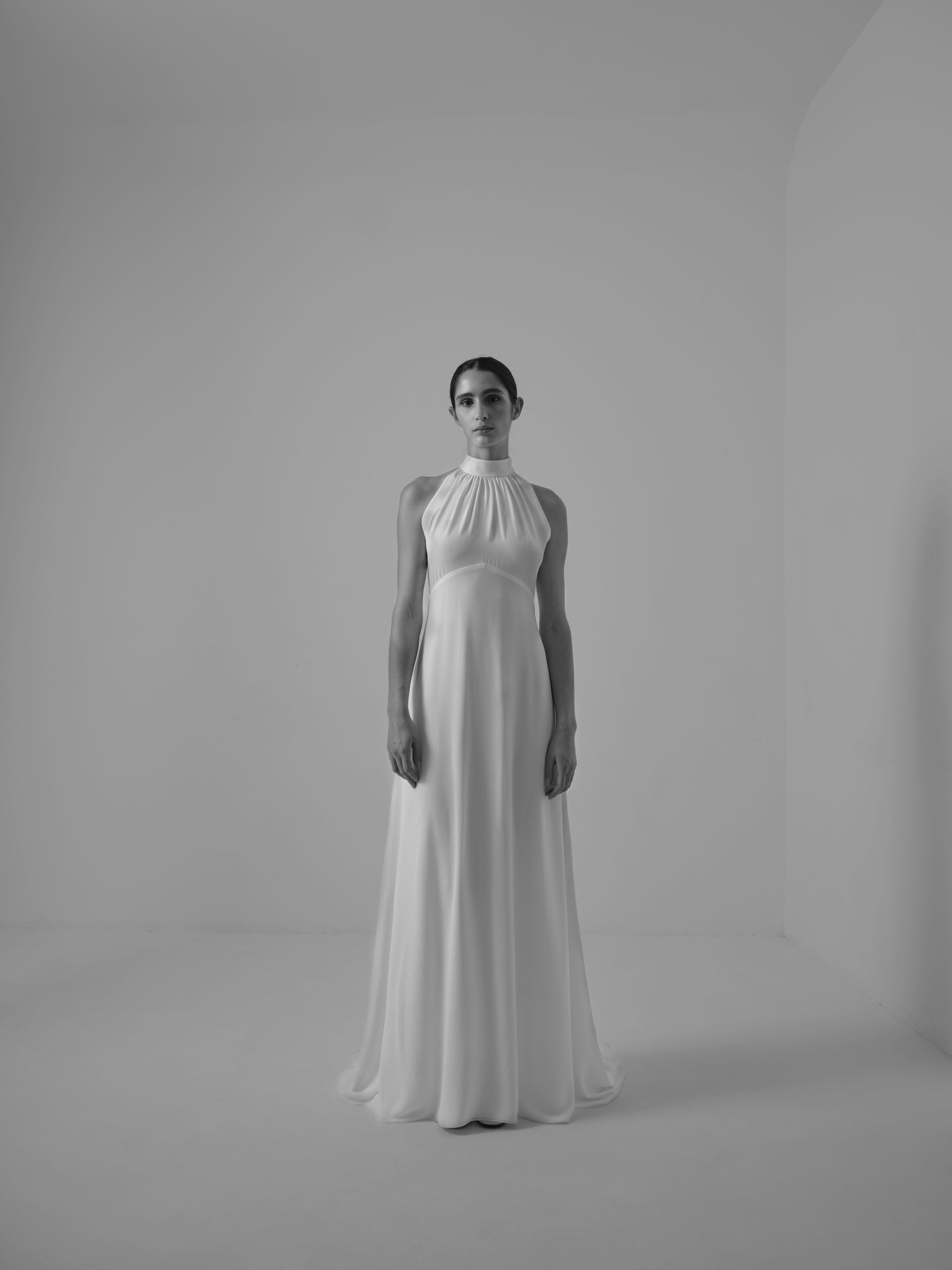 Simple Pleated Halter-Neck Sheath Gown with Detachable Sleeves by Marta Martí - Image 1