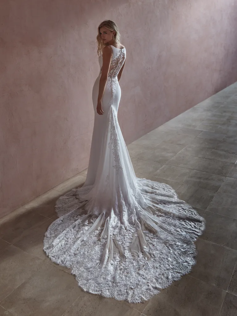 Sleek And Romantic Fit-and-Flare Gown With Illusion Back by Pronovias - Image 2