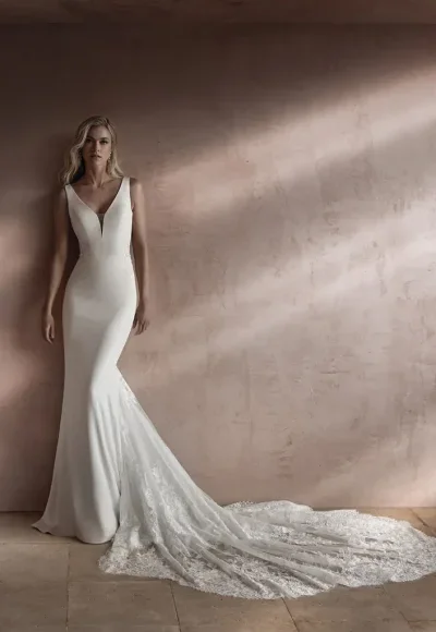 Sleek And Romantic Fit-and-Flare Gown With Illusion Back by Pronovias