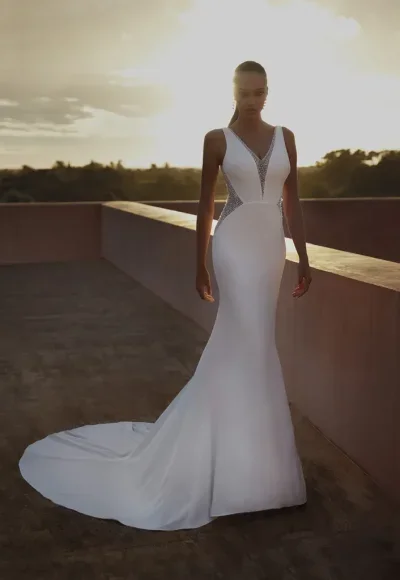Sleek And Modern Sheath Gown With Illusion Detail by Pronovias