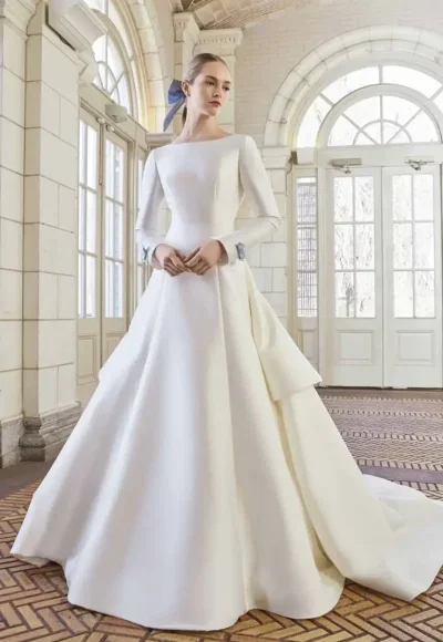 Modest And Sophisticated Modified A-Line Gown With Blue Bows by Sareh Nouri