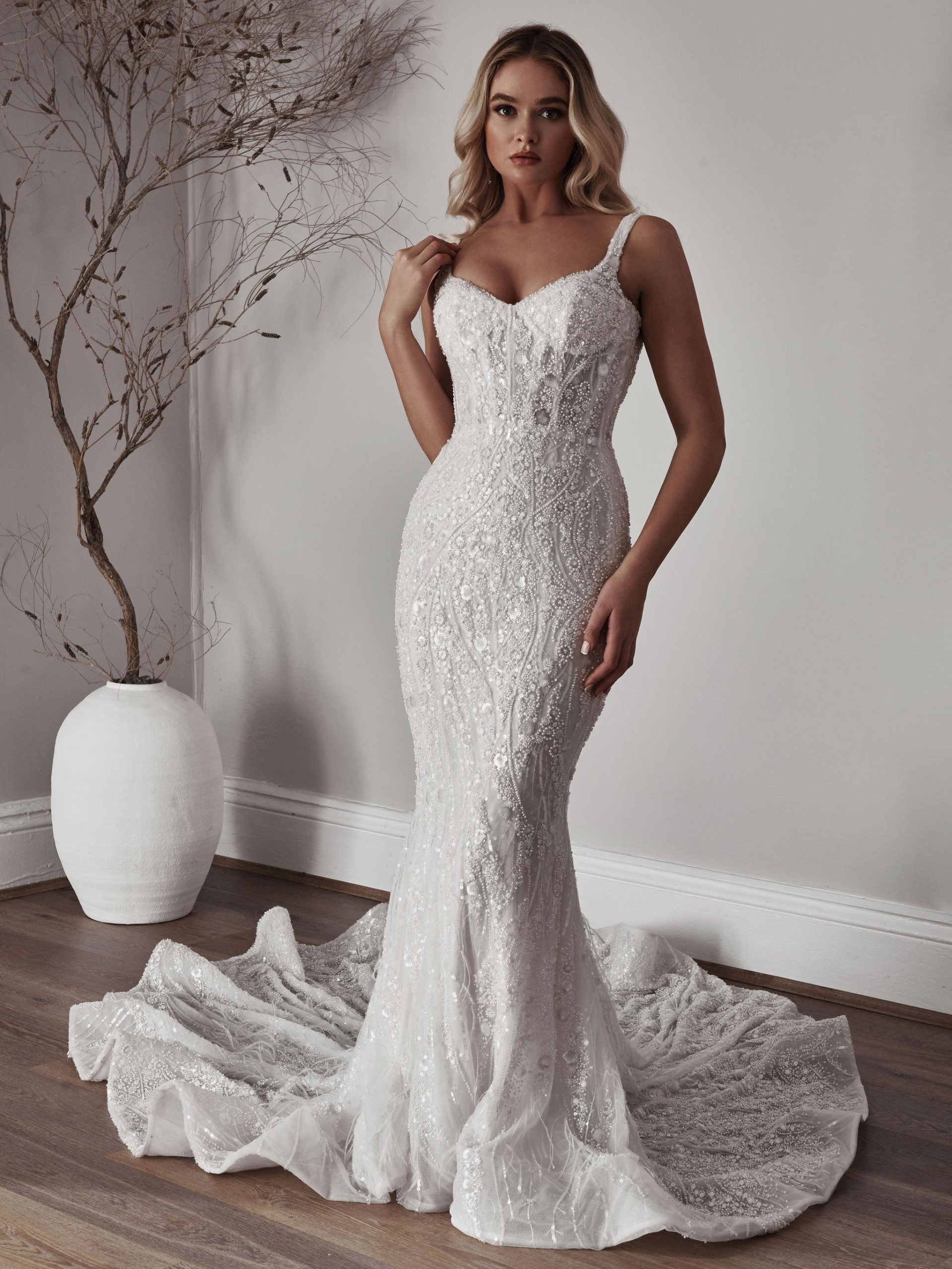 Chic and Sexy Beaded Fit-and-Flare Gown by Blanche Bridal - Image 1