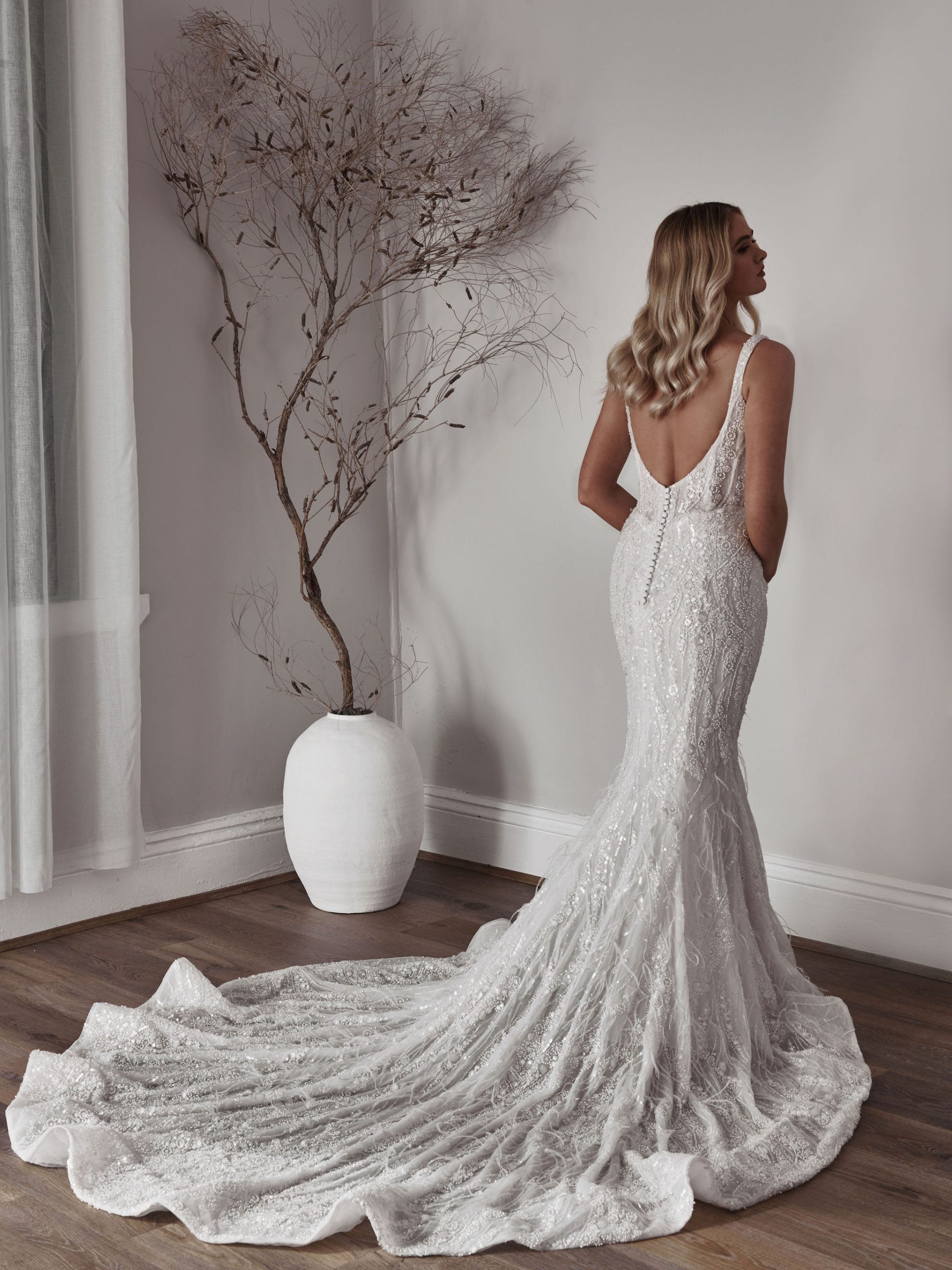 Chic and Sexy Beaded Fit-and-Flare Gown by Blanche Bridal - Image 2